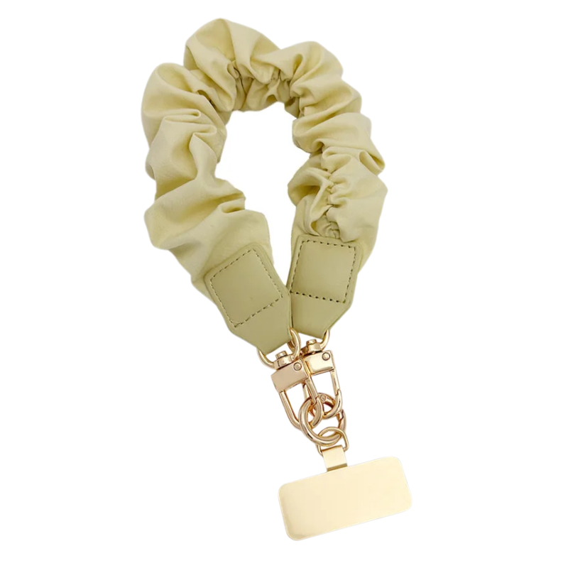 light yellow scrunchy style wrist strap for connecting to a phone