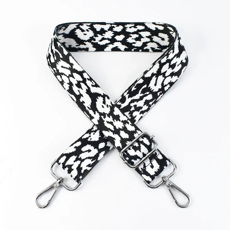 Ocelot patterned bag strap on a white background
