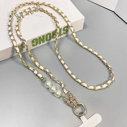 Elegant leather-look cross body phone strap with metal and pearl detailing