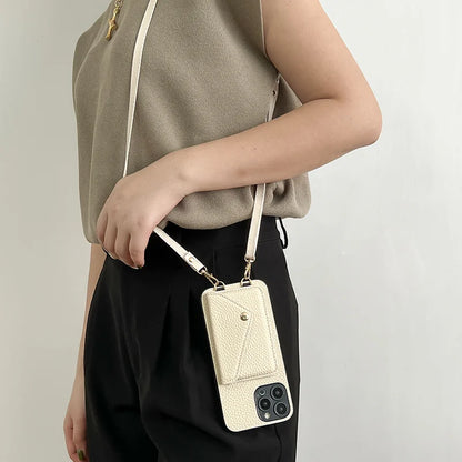 Person wearing an beige leather phone case with strap against a light background