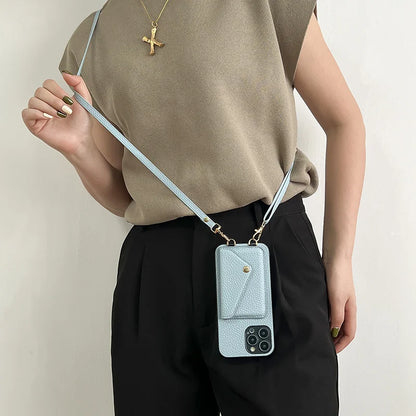 Person wearing a blue leather phone case with strap against a light background